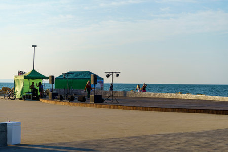 Taman, Russia - August 1, 2022: Modern embankment of Taman with people and attractionsのeditorial素材