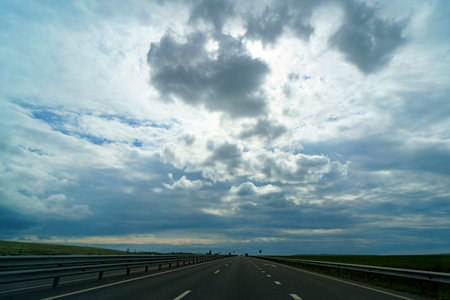 The Tavrida highway in the Crimea under a cloudy sky.の写真素材