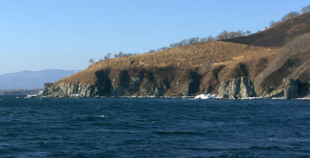 Seascape overlooking rocky shoreの写真素材