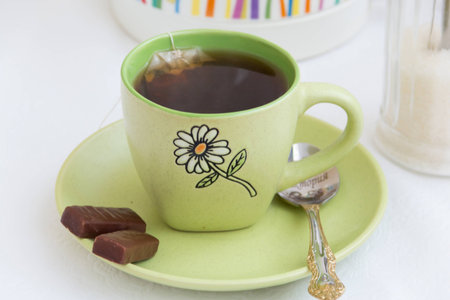 green color cup of teaの写真素材