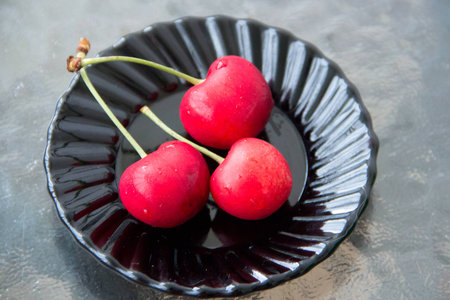 sweet berries sweet cherry and twigsの写真素材