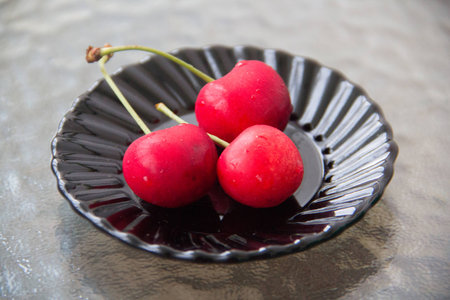 sweet berries sweet cherry and twigsの写真素材