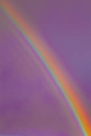 Double rainbow cityscape after the rain. Colorful rainbow above the city.の写真素材