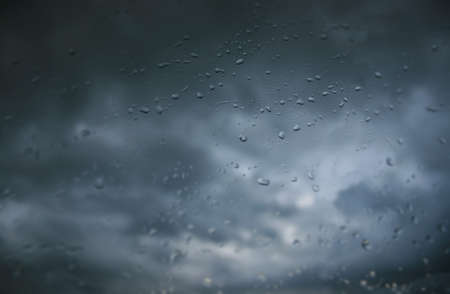 stormy sky, drops on glassの写真素材