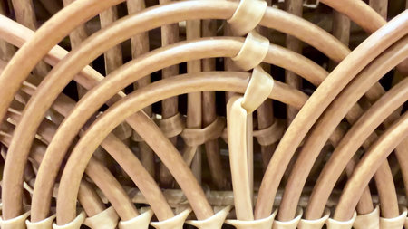 Closeup view of a meticulously detailed woven rattan pattern, beautifully highlighting its natural...