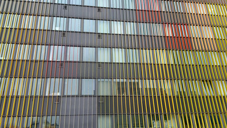 This unique building facade showcases vibrant colors alongside modern architectural design elements...