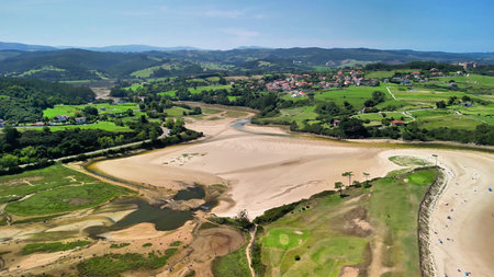 Discover the stunning beauty of this peaceful riverbank along with the lush green countryside as...