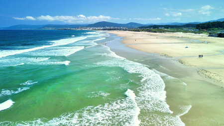 This stunning beach features turquoise waters and sunny skies, perfect for summer escapes and vacationsの写真素材