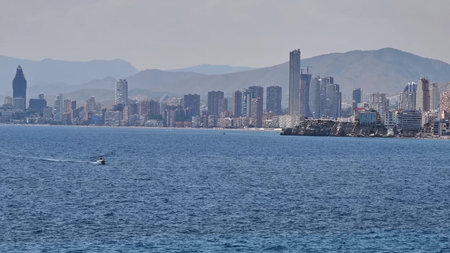 A breathtaking view of a stunning coastal skyline reflecting the incredible charm of urban living right by the seaの写真素材