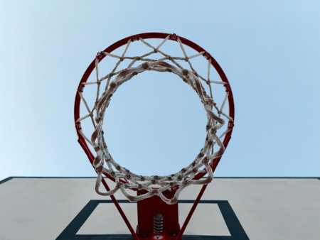 A clear and unobstructed view of a basketball hoop, which is perfect for various sports and outdoor activity themesの写真素材
