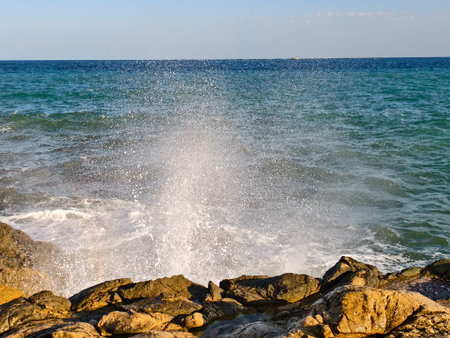 tranquil blue waters and gentle breeze, serene turquoise waters caressing rocky shoreline