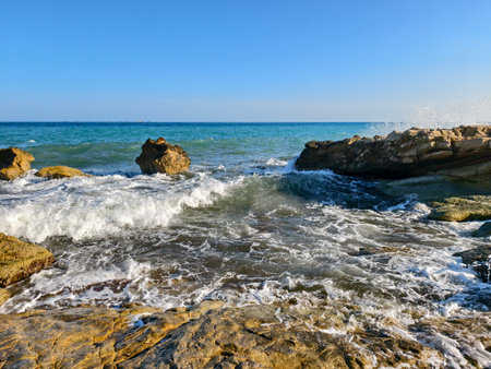 serene coastal scene with waves, relaxed seaside landscape showing tidal movements and coastal lightの写真素材