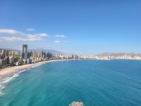 stunning turquoise bay landscape, idyllic turquoise bay featuring gentle waves and distant towersの写真素材
