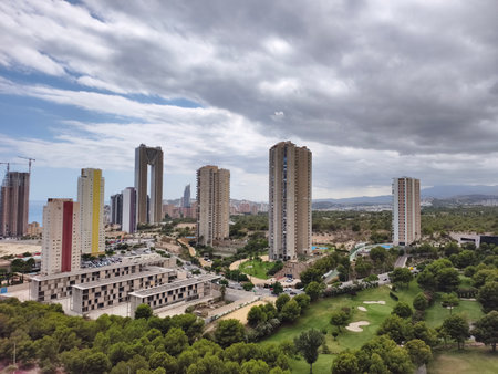 cityscape with green, urban view with parks, panoramic city view featuring greenery and skyscrapersの写真素材