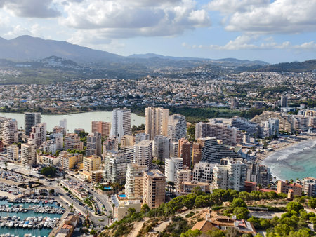 coastal city skyline, mediterranean seascape with yachts, aerial view of seaside resort scenesの写真素材