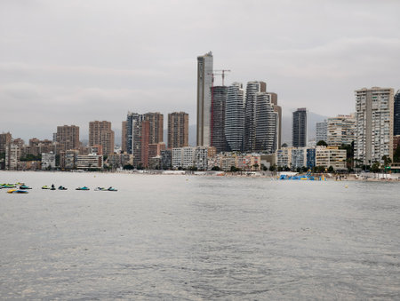 tranquil city scene, calm boat scene with city views, peaceful urban waterside with boatsの写真素材