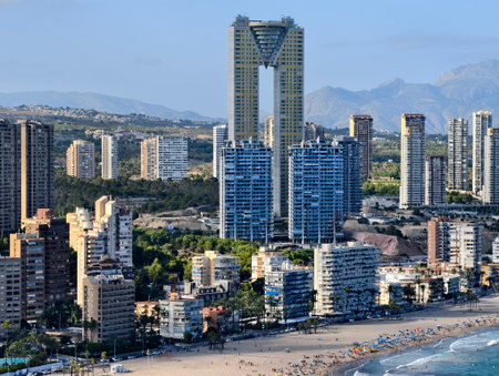 vibrant seaside resort scene, sunlit beach characterized by lively and spirited resort environmentの写真素材