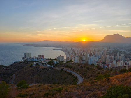 hillside park overlooks bay and city, elevated vantage point reveals sweeping bay and cityscapeの写真素材