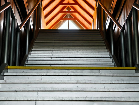 modern staircase with clean aesthetics, sleek white steps leading upward in minimalist spaceの写真素材