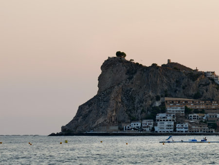peaceful seaside village at dusk, tranquil seaside community at sunsetの写真素材