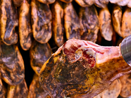 Golden rinds showcase stacked ham slices neatly, Carefully arranged ham with textured skins and warm...