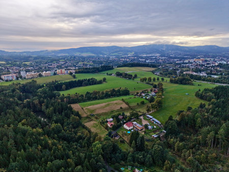 Aerial Agricultural Patchwork At Town Edge, Mosaic Of Fields And Orchards Meeting Suburban Outskirts, Windingの写真素材
