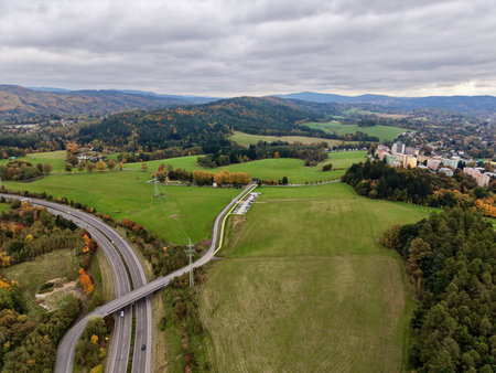 Aerial Rural Fields And Village Horizon Showing Farm Tracks, Small Settlement, Hedgerows, Pocket Woodlandsの写真素材