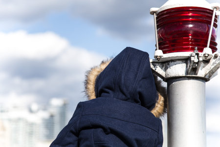 girl leaning on the beacon
