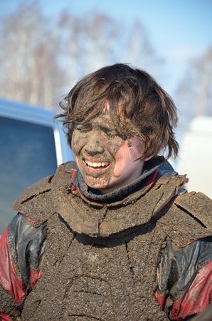 Russia, Samara March 7,2011. MX Junior Krasilnikov is covered with mudの写真素材