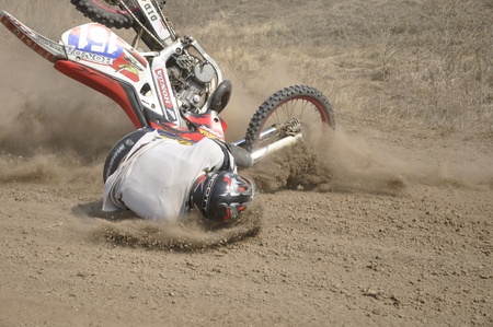 RUSSIA, SAMARA - APRIL 30: Motocross unknown rider on the a motorbike falls the Regional  Motocross Championship on April 30, 2011 in Samara, Russiaのeditorial素材