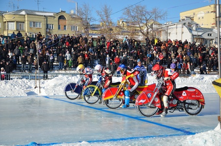 SAMARA, RUSSIA - JANUARY 29: Start of arrival, riders on motorcycles with spiked, ice speedway Cup of Russia January 29, 2012 in Samara, Russiaのeditorial素材
