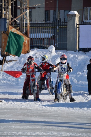 SAMARA, RUSSIA - JANUARY 29: Group of unknown riders at the entrance to the stadium track, motorcycle races ice the Cup of Russia January 29, 2012 in Samara, Russiaのeditorial素材