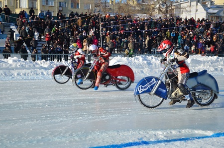 SAMARA, RUSSIA - JANUARY 29: Start of arrival, riders on motorcycles with spiked, ice speedway Cup of Russia January 29, 2012 in Samara, Russiaのeditorial素材