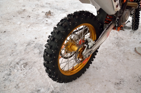 motocross motorcycle rear wheel spikes for snow rideの写真素材