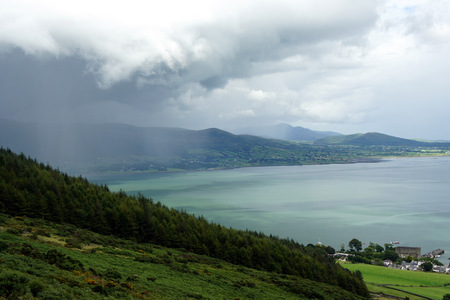 Rain over Northern Ireland.A view from the Republic of Ireland.の写真素材