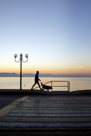 Pedestrian crossing to the beach in the early morning.Ipsos.Corfu.の写真素材