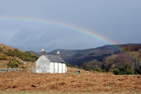 Rainbow over an abandoned house in the Wicklow Mountains.の写真素材