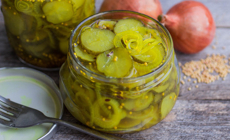 marinated sliced cucumbers with onions and mustardの写真素材