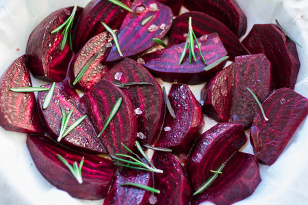 sliced beets for roasting with sea salt and rosemaryの写真素材