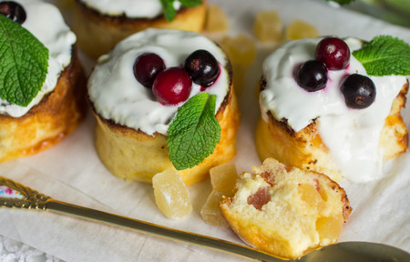 Curd pudding with candied fruit and fresh berries. Soft focusの写真素材