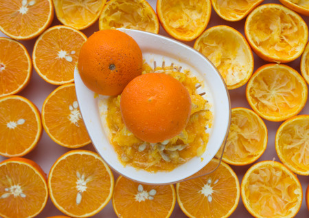 Oranges and manual juicerの写真素材