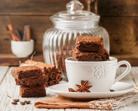 Squares brownie in a white Cup. Chocolate dessert. Traditional dish of American cuisine. Selective focusの写真素材