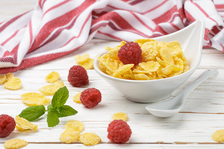 Cornflakes with fresh raspberries. Healthy Breakfast. Selective focusの写真素材