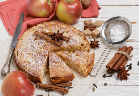 Homemade Apple pie with cinnamon, cardamom and star anise. Traditional autumn cakes for tea. Selective focusの写真素材