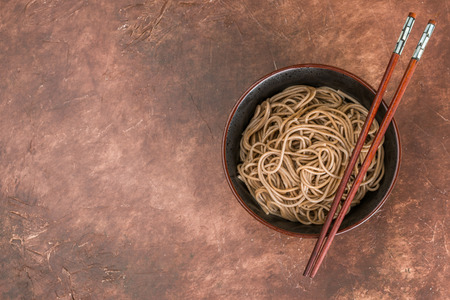 Buckwheat soba noodles - a traditional dish of Asian cuisine. Selective focus. Copy spaceの写真素材