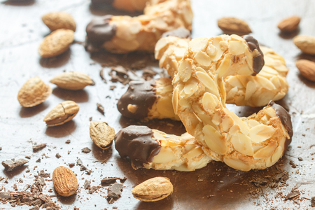 Homemade shortbread cookies with almonds and chocolate. Crispy dessert for tea and coffee. Selective focusの写真素材