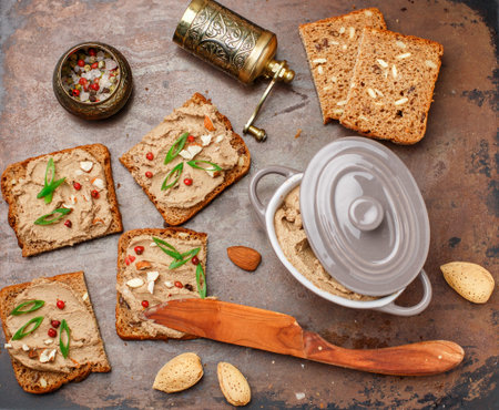 Fresh homemade chicken (duck, goose, rabbit, Turkey) liver pate with almonds, pink pepper and green...