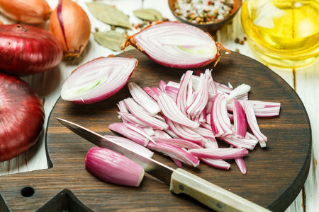 Chopped red onions. Ingredients for onion chutney, marmalade, jam, marinade,  confiture, pickle.  Preparation of delicious snacks. Selective focusの写真素材