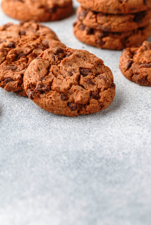 Freshly baked homemade crunchy cookies with chocolate chips, peanut butter or salted caramel. A...
