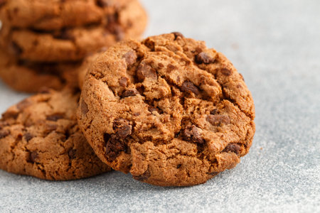 Freshly baked homemade crunchy cookies with chocolate chips, peanut butter or salted caramel. A...